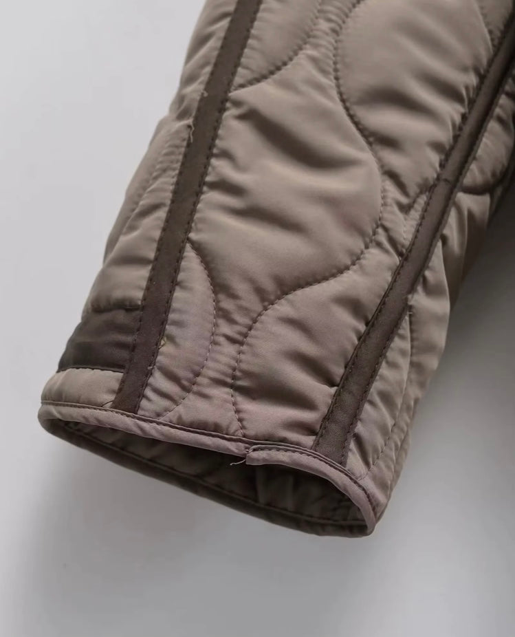 Veste matelassée col haut femme