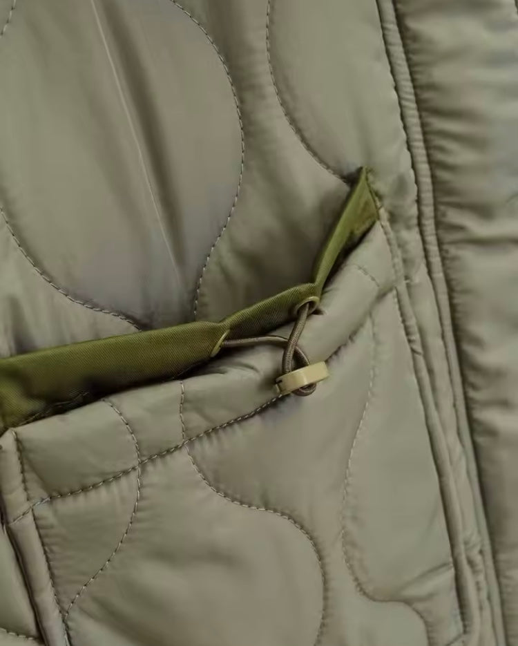 Veste matelassée col haut femme