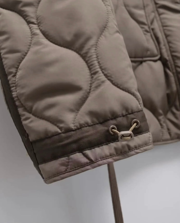 Veste matelassée col haut femme