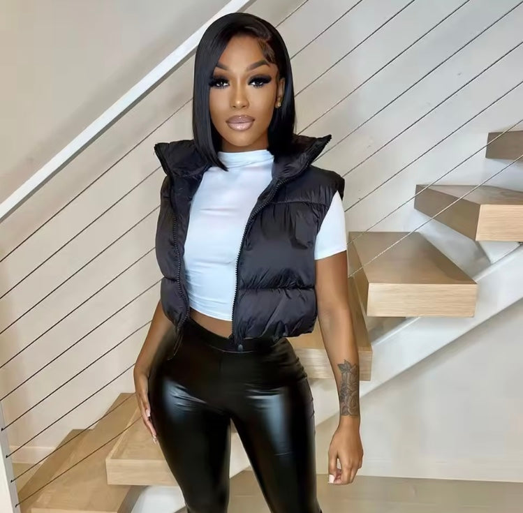 Manteau court sans manches avec fermeture